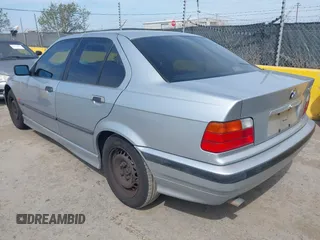 1997 BMW 3 Series 318iA with VIN WBACC0322VEK25478, listed as a IAAI auction lot 42033040 with 212,320 mi miles. Bid and sale history available at carsss.com. Image 3.