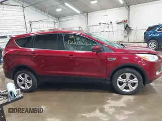 2013 Ford Escape SE with VIN 1FMCU9GX1DUC56361, listed as a IAAI auction lot 42042233 with 136,441 mi miles and . Bid and sale history available at DreamBid. Image 13.