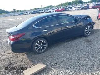 2017 Nissan Altima SR with VIN 1N4AL3AP6HC483132, listed as a IAAI auction lot 42250191 with 127,493 mi miles and . Bid and sale history available at DreamBid. Image 4.