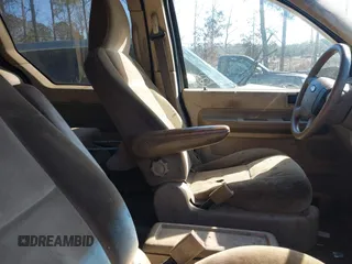 2004 Ford Freestar SES z VIN 2FMZA576X4BA08196, wystawiony jako IAAI lot #41563497 z przebiegiem Nie podano mil oraz . Historia ofert i sprzedaży dostępna na DreamBid. Obrazek 5.