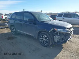 2018 Mitsubishi Outlander ES z VIN JA4AZ3A35JZ058407, wystawiony jako IAAI lot #41428922 z przebiegiem 141 701 mil mil oraz . Historia ofert i sprzedaży dostępna na DreamBid. Obrazek 1.