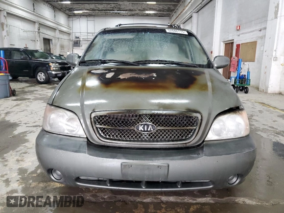 2005 Kia Sedona LX with VIN KNDUP132656723226, listed as a Copart auction lot 52886115 with 0 mi miles and Salvage Title. Bid and sale history available at carsss.com. Image 5.
