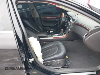 2011 Cadillac CTS Luxury with VIN 1G6DF5EYXB0103430, listed as a IAAI auction lot 42105337 with 205,069 mi miles and . Bid and sale history available at DreamBid. Image 5.