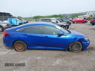 2017 Honda Civic LX z VIN 19XFC2F58HE058408, wystawiony jako IAAI lot #42341904 z przebiegiem 93 533 mil mil oraz . Historia ofert i sprzedaży dostępna na DreamBid. Obrazek 13.