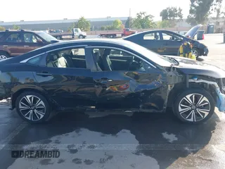 2016 Honda Civic Sedan EX-L with VIN 19XFC1F73GE215112, listed as a IAAI auction lot 42093218 with 67,233 mi miles. Bid and sale history available at carsss.com. Image 14.