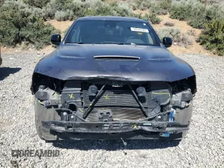 2018 Dodge Durango GT z VIN 1C4RDJDG4JC369274, wystawiony jako Copart lot #59345585 z przebiegiem 56 813 mil mil oraz Szkoda całkowita • Salvage title. Historia ofert i sprzedaży dostępna na DreamBid. Obrazek 5.