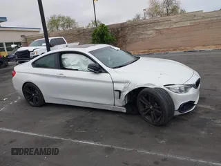 2015 BMW 4 Series 435i with VIN WBA3R1C50FK194927, listed as a IAAI auction lot 42104577 with Not provided miles and . Bid and sale history available at DreamBid. Image 13.