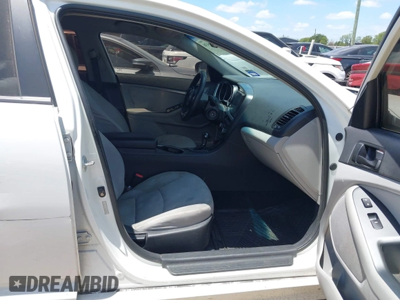 2015 Kia Optima LX with VIN KNAGM4A74F5605007, listed as a IAAI auction lot 42796438 with 126,819 mi miles and . Bid and sale history available at DreamBid. Image 5.