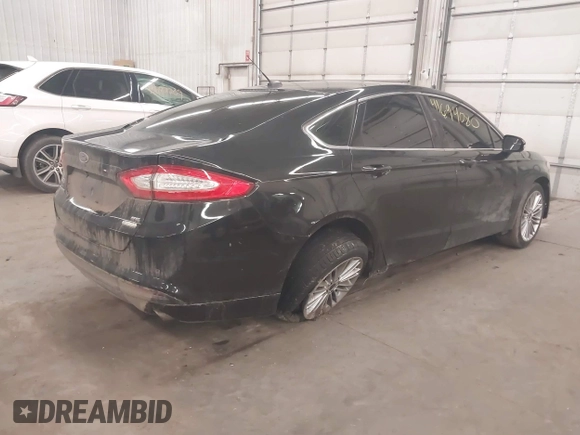 2015 Ford Fusion SE with VIN 3FA6P0HD9FR144173, listed as a IAAI auction lot 41694080 with 108,696 mi miles. Bid and sale history available at carsss.com. Image 4.