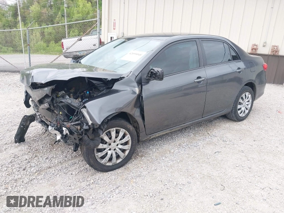 2012 Toyota Corolla L with VIN 2T1BU4EE3CC901530, listed as a IAAI auction lot 42099048 with 210,117 mi miles. Bid and sale history available at carsss.com. Image 2.