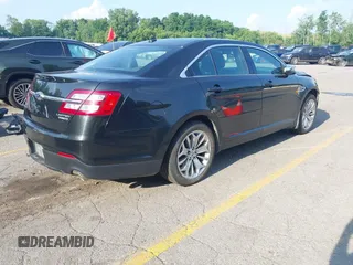 2014 Ford Taurus Limited with VIN 1FAHP2F86EG163392, listed as a IAAI auction lot 42538336 with 131,910 mi miles and . Bid and sale history available at DreamBid. Image 4.