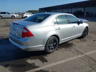2011 Ford Fusion SE with VIN 3FAHP0HA0BR144927, listed as a IAAI auction lot 41938722 with 138,207 mi miles. Bid and sale history available at carsss.com. Image 4.