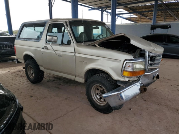 1996 Ford Bronco XL z VIN 1FMEU15N0TLB63427, wystawiony jako Copart lot #82779084 z przebiegiem 175 679 mil mil oraz Szkoda całkowita • Salvage title. Historia ofert i sprzedaży dostępna na DreamBid. Obrazek 4.