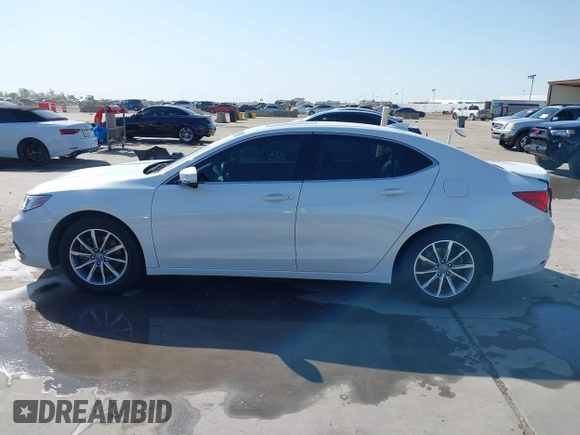 2020 Acura TLX z VIN 19UUB1F32LA011682, wystawiony jako IAAI lot #41942085 z przebiegiem 53 726 mil mil oraz . Historia ofert i sprzedaży dostępna na DreamBid. Obrazek 14.
