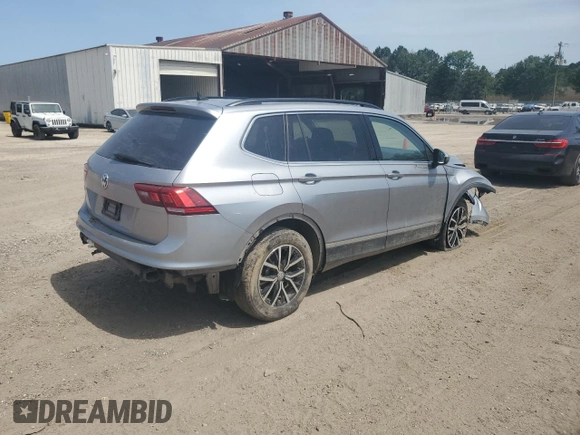 2021 Volkswagen Tiguan SE z VIN 3VV3B7AX9MM086196, wystawiony jako Copart lot #56989655 z przebiegiem 67 004 mil mil oraz Szkoda całkowita • Salvage title. Historia ofert i sprzedaży dostępna na DreamBid. Obrazek 3.
