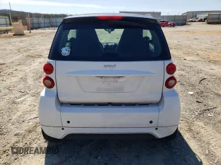 2015 Smart fortwo Passion z VIN WMEEJ3BA3FK809467, wystawiony jako Copart lot #50590865 z przebiegiem 83 821 mil mil oraz Szkody całkowita. Historia ofert i sprzedaży dostępna na DreamBid. Obrazek 11.