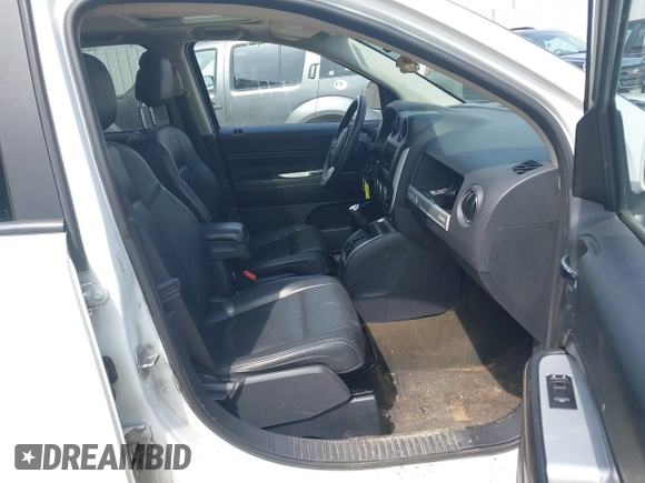2017 Jeep Compass High Altitude with VIN 1C4NJCEB1HD212246, listed as a IAAI auction lot 42095253 with 123,834 mi miles. Bid and sale history available at carsss.com. Image 5.
