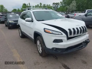 2014 Jeep Cherokee Latitude z VIN 1C4PJMCB6EW166351, wystawiony jako IAAI lot #42398943 z przebiegiem 100 341 mil mil oraz . Historia ofert i sprzedaży dostępna na DreamBid. Obrazek 1.