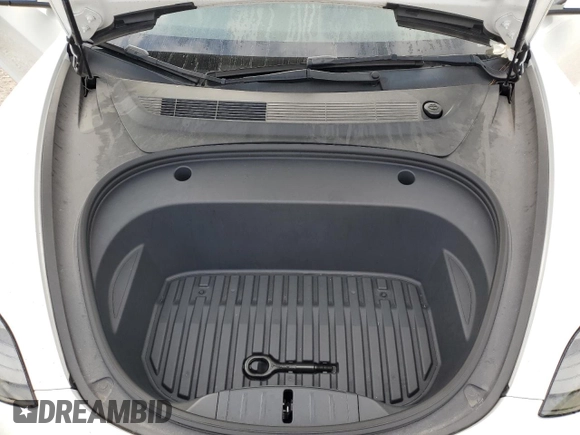 2023 Tesla Model 3 z VIN 5YJ3E1EA2PF439119, wystawiony jako Copart lot #60708065 z przebiegiem 48 717 mil mil oraz Nie do naprawy • Non repairable. Historia ofert i sprzedaży dostępna na DreamBid. Obrazek 11.