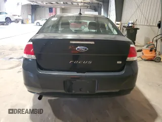 2008 Ford Focus SE z VIN 1FAHP35N98W121449, wystawiony jako Copart lot #60323735 z przebiegiem 83 990 mil mil oraz Czysty tytuł • Clean title. Historia ofert i sprzedaży dostępna na DreamBid. Obrazek 6.