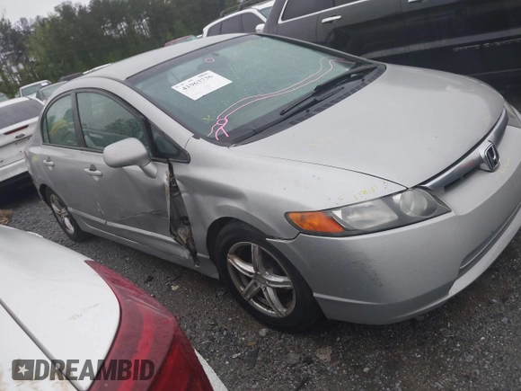 2006 Honda Civic LX with VIN 2HGFA16556H520894, listed as a IAAI auction lot 41963736 with 166,682 mi miles and . Bid and sale history available at DreamBid. Image 13.