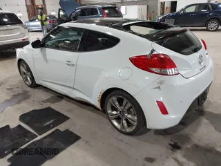 2012 Hyundai Veloster w/Black Int with VIN KMHTC6AD3CU080878, listed as a IAAI auction lot 42377636 with 152,430 mi miles and . Bid and sale history available at DreamBid. Image 3.
