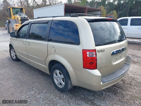 2010 Dodge Grand Caravan SXT with VIN 2D4RN5DX5AR290131, listed as a IAAI auction lot 41314452 with 194,819 mi miles. Bid and sale history available at carsss.com. Image 3.