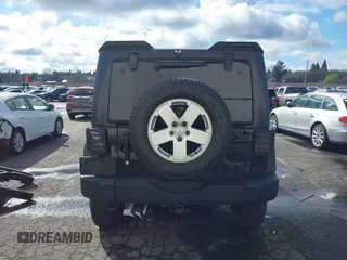 2011 Jeep Wrangler Unlimited Rubicon with VIN 1J4BA6H13BL513311, listed as a IAAI auction lot 41809207 with 124,716 mi miles and . Bid and sale history available at DreamBid. Image 16.