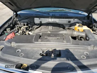 2015 Lincoln Navigator z VIN 5LMJJ2HT5FEJ06248, wystawiony jako Copart lot #52876645 z przebiegiem 270 523 mil mil oraz Szkoda całkowita • Salvage title. Historia ofert i sprzedaży dostępna na DreamBid. Obrazek 13.