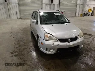 2005 Suzuki Aerio SX z VIN JS2RC61H555300879, wystawiony jako Copart lot #80481084 z przebiegiem 129 196 mil mil oraz Szkoda całkowita • Salvage title. Historia ofert i sprzedaży dostępna na DreamBid. Obrazek 10.