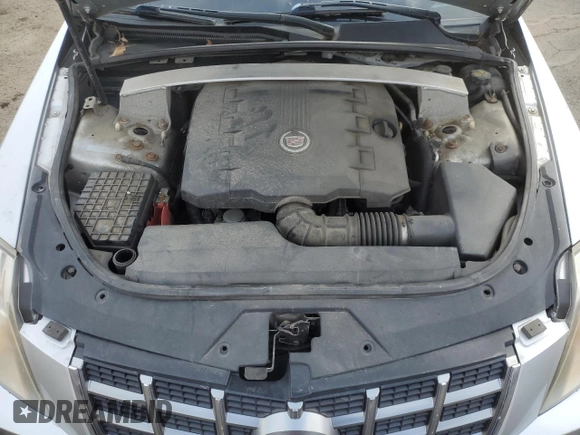 2012 Cadillac CTS z VIN 1G6DC5E59C0125371, wystawiony jako Copart lot #45761045 z przebiegiem 149 624 mil mil oraz Czysty tytuł • Clean title. Historia ofert i sprzedaży dostępna na DreamBid. Obrazek 11.
