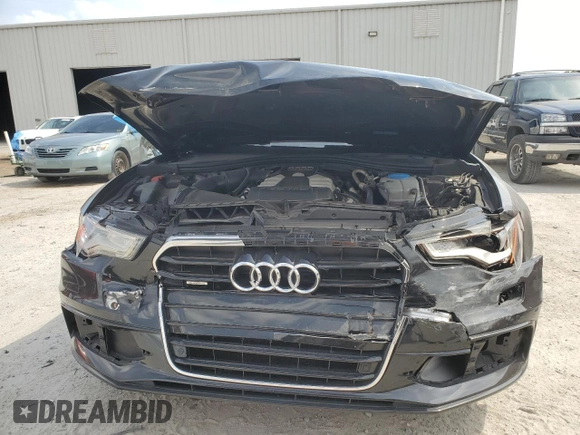 2014 Audi A6 Prestige z VIN WAUHGAFC8EN062243, wystawiony jako Copart lot #54622005 z przebiegiem 106 729 mil mil oraz Szkoda całkowita • Salvage title. Historia ofert i sprzedaży dostępna na DreamBid. Obrazek 5.
