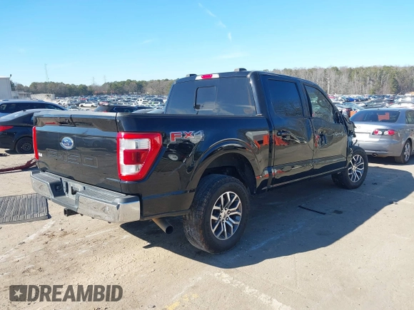 2021 Ford F-150 XL with VIN 1FTFW1E58MFA84347, listed as a IAAI auction lot 41402387 with 133,150 mi miles. Bid and sale history available at carsss.com. Image 4.