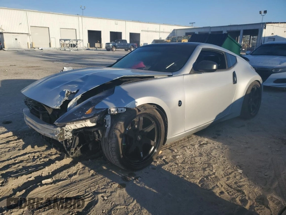 2015 Nissan 370Z with VIN JN1AZ4EH2FM443464, listed as a Copart auction lot 83410654 with 116,692 mi miles and Salvage Title. Bid and sale history available at carsss.com. Image 1.