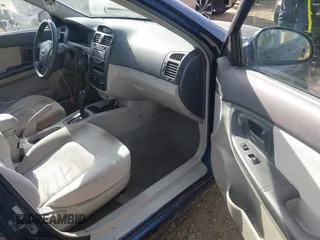 2006 Kia Spectra EX with VIN KNAFE121365221138, listed as a IAAI auction lot 41855171 with 158,425 mi miles. Bid and sale history available at carsss.com. Image 5.