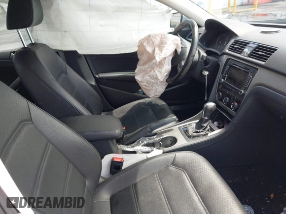 2014 Volkswagen Passat SE with VIN 1VWBT7A32EC070023, listed as a IAAI auction lot 42202567 with 116,438 mi miles and . Bid and sale history available at DreamBid. Image 5.