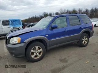 2005 Mazda Tribute S with VIN 4F2CZ94125KM23653, listed as a Copart auction lot 84037604 with 162,437 mi miles and Salvage Title. Bid and sale history available at DreamBid. Image 1.