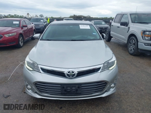 2013 Toyota Avalon XLE z VIN 4T1BK1EB2DU044501, wystawiony jako IAAI lot #41905442 z przebiegiem 97 169 mil mil oraz . Historia ofert i sprzedaży dostępna na DreamBid. Obrazek 12.