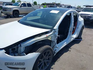 2020 Tesla Model 3 Standard Range Plus z VIN 5YJ3E1EA6LF659311, wystawiony jako IAAI lot #42363341 z przebiegiem 96 378 mil mil oraz . Historia ofert i sprzedaży dostępna na DreamBid. Obrazek 6.