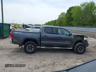 2017 Toyota Tacoma SR5 with VIN 3TMAZ5CN7HM026618, listed as a IAAI auction lot 42033682 with 96,430 mi miles and . Bid and sale history available at carsss.com. Image 14.