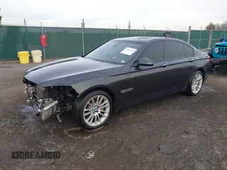 2015 BMW 7 Series 750i xDrive with VIN WBAYB6C56FG299238, listed as a IAAI auction lot 41441393 with 62,396 mi miles. Bid and sale history available at carsss.com. Image 2.