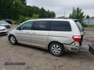 2007 Honda Odyssey EX with VIN 5FNRL38427B513477, listed as a Copart auction lot 62457695 with 216,977 mi miles and Salvage title. Bid and sale history available at DreamBid. Image 2.