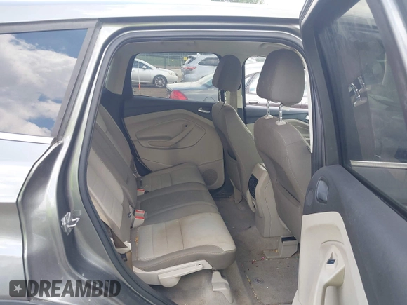 2013 Ford Escape SE with VIN 1FMCU9G95DUC01185, listed as a IAAI auction lot 42602840 with 140,697 mi miles and . Bid and sale history available at DreamBid. Image 8.