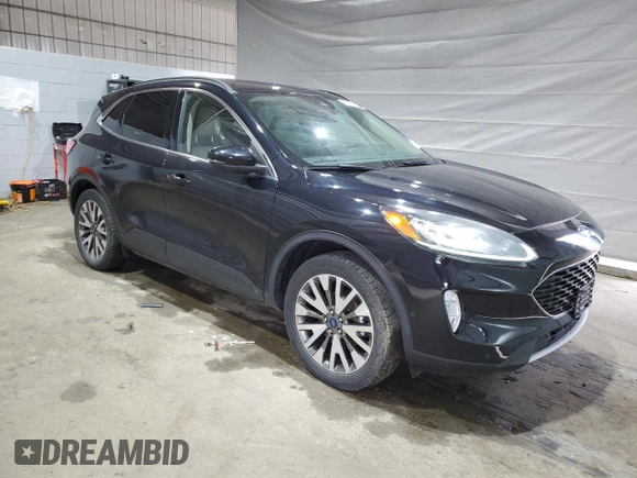 2020 Ford Escape Titanium с VIN 1FMCU9J92LUA37546, выставлен на аукционе Copart как лот 55102925 с пробегом 83 059 миль миль и Списание • Salvage title. История ставок и продаж доступна на DreamBid. Изображение 4.