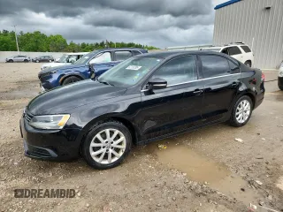 2014 Volkswagen Jetta SE with VIN 3VWD17AJ1EM443497, listed as a Copart auction lot 62195295 with 99,200 mi miles and Clean title. Bid and sale history available at DreamBid. Image 1.