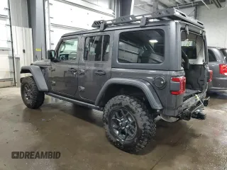 2024 Jeep Wrangler Willys with VIN 1C4PJXDG5RW312580, listed as a Copart auction lot 49144005 with 5,713 mi miles and Salvage Title. Bid and sale history available at carsss.com. Image 2.