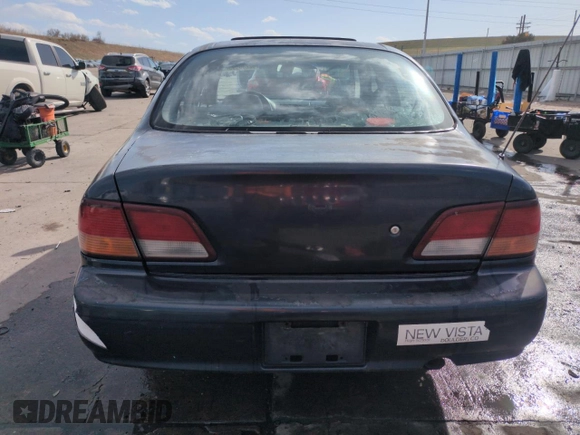 1997 Nissan Maxima GXE with VIN JN1CA21D0VT201140, listed as a Copart auction lot 52230495 with 286,440 mi miles and Clean title. Bid and sale history available at DreamBid. Image 6.