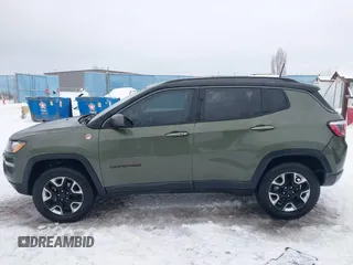 2018 Jeep Compass Trailhawk with VIN 3C4NJDDB5JT190890, listed as a IAAI auction lot 41251405 with 35,320 mi miles and . Bid and sale history available at carsss.com. Image 14.