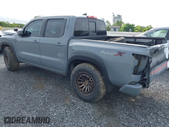 2022 Nissan Frontier SV z VIN 1N6ED1EJ0NN629038, wystawiony jako IAAI lot #41313351 z przebiegiem 98 234 mil mil oraz . Historia ofert i sprzedaży dostępna na DreamBid. Obrazek 3.