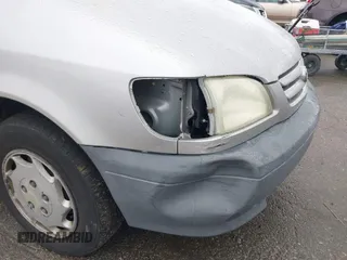 2002 Toyota Sienna CE with VIN 4T3ZF19C02U493816, listed as a IAAI auction lot 41813141 with 216,915 mi miles. Bid and sale history available at carsss.com. Image 6.